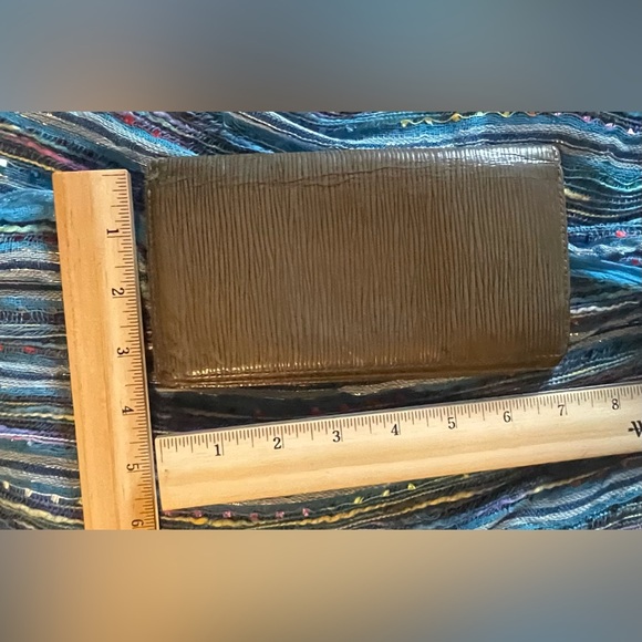 Brown Louis Vuitton epi-leather long wallet. Measures approximately 7 x 4”. GUC - Picture 6 of 14